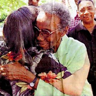 Lula Bell Houston embraces Laura Jackson